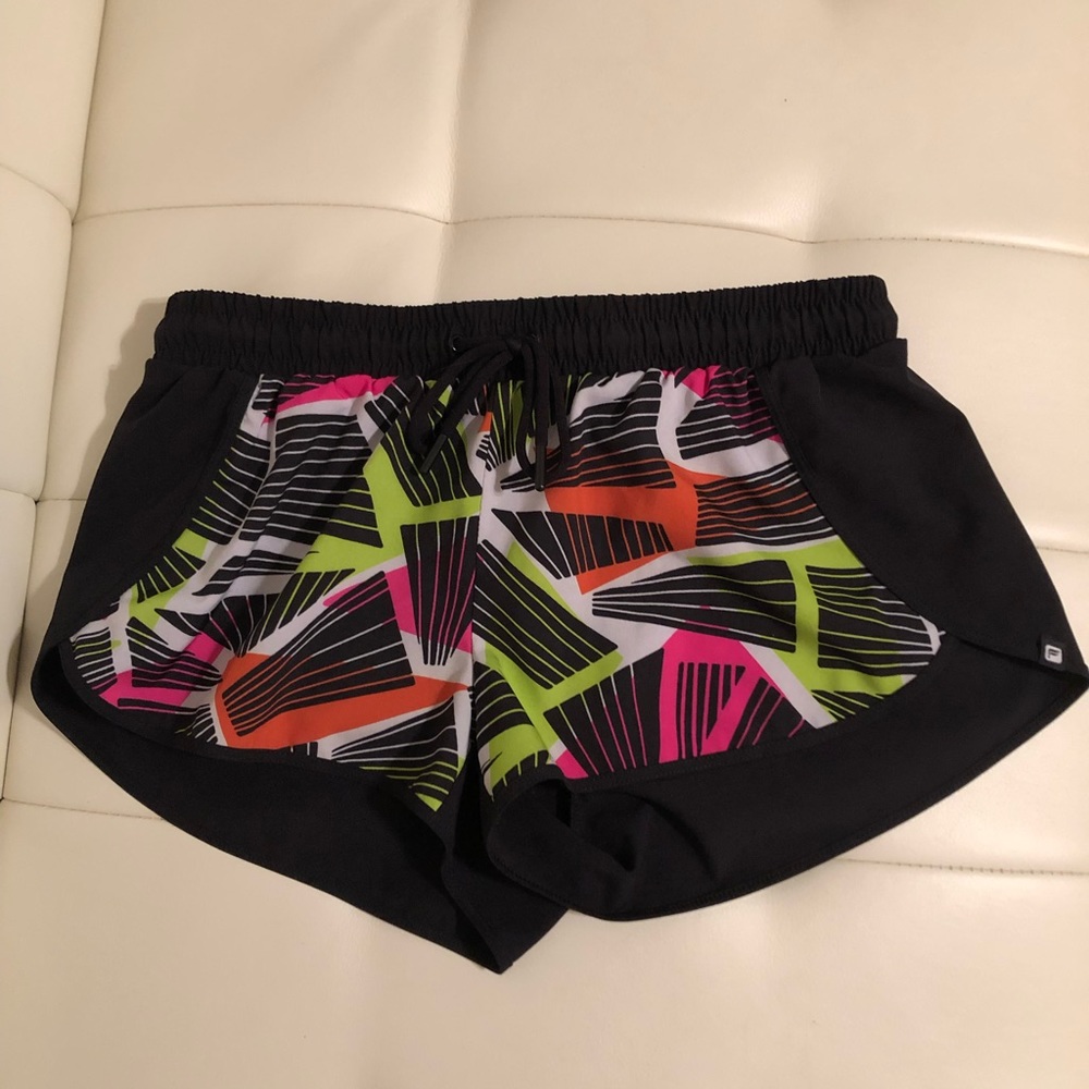 Fabletics running shorts size xs.  Pocket in the back and drawstring waist.